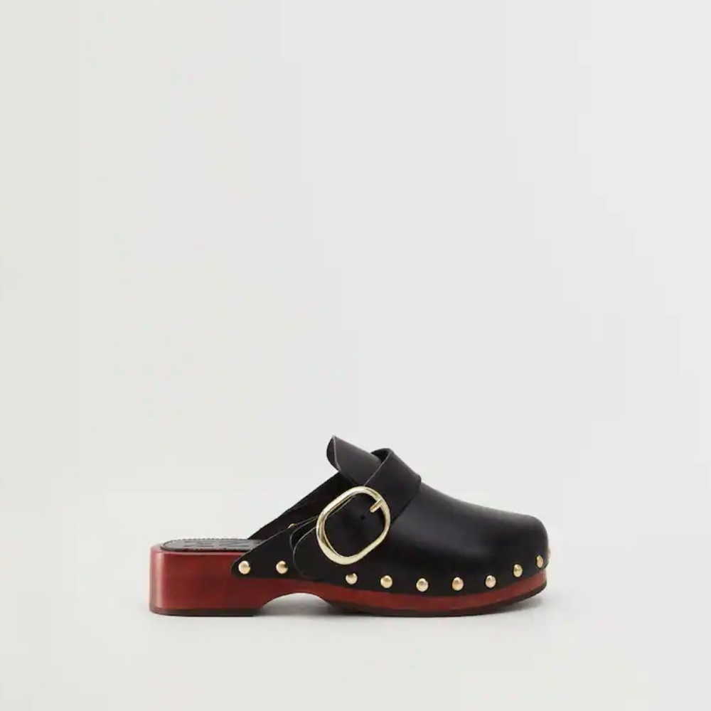 Black leather studded clogs